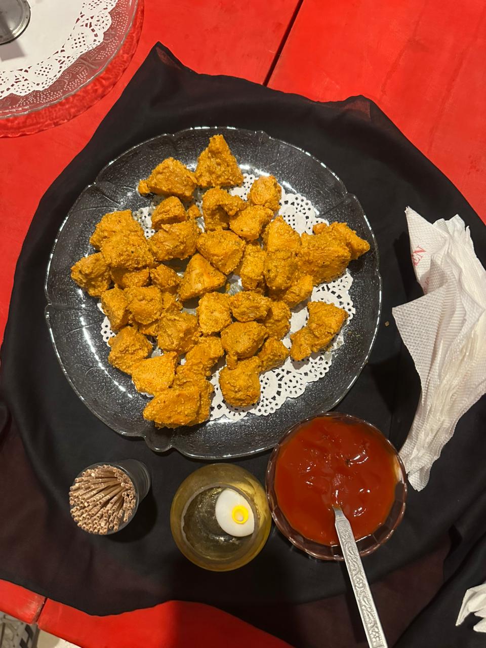 Crisp fried chicken starters on a platter