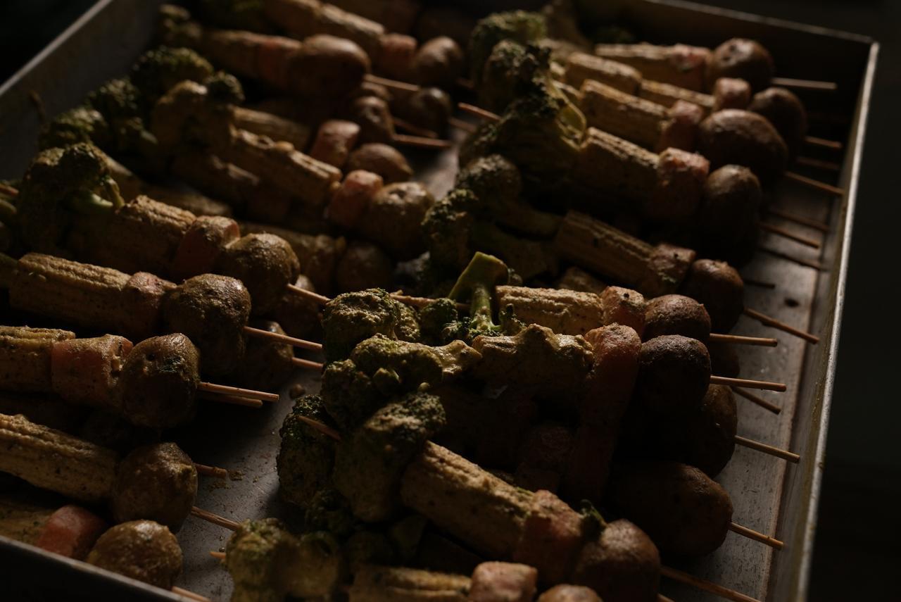 Tray of assorted marinated skewers before grilling