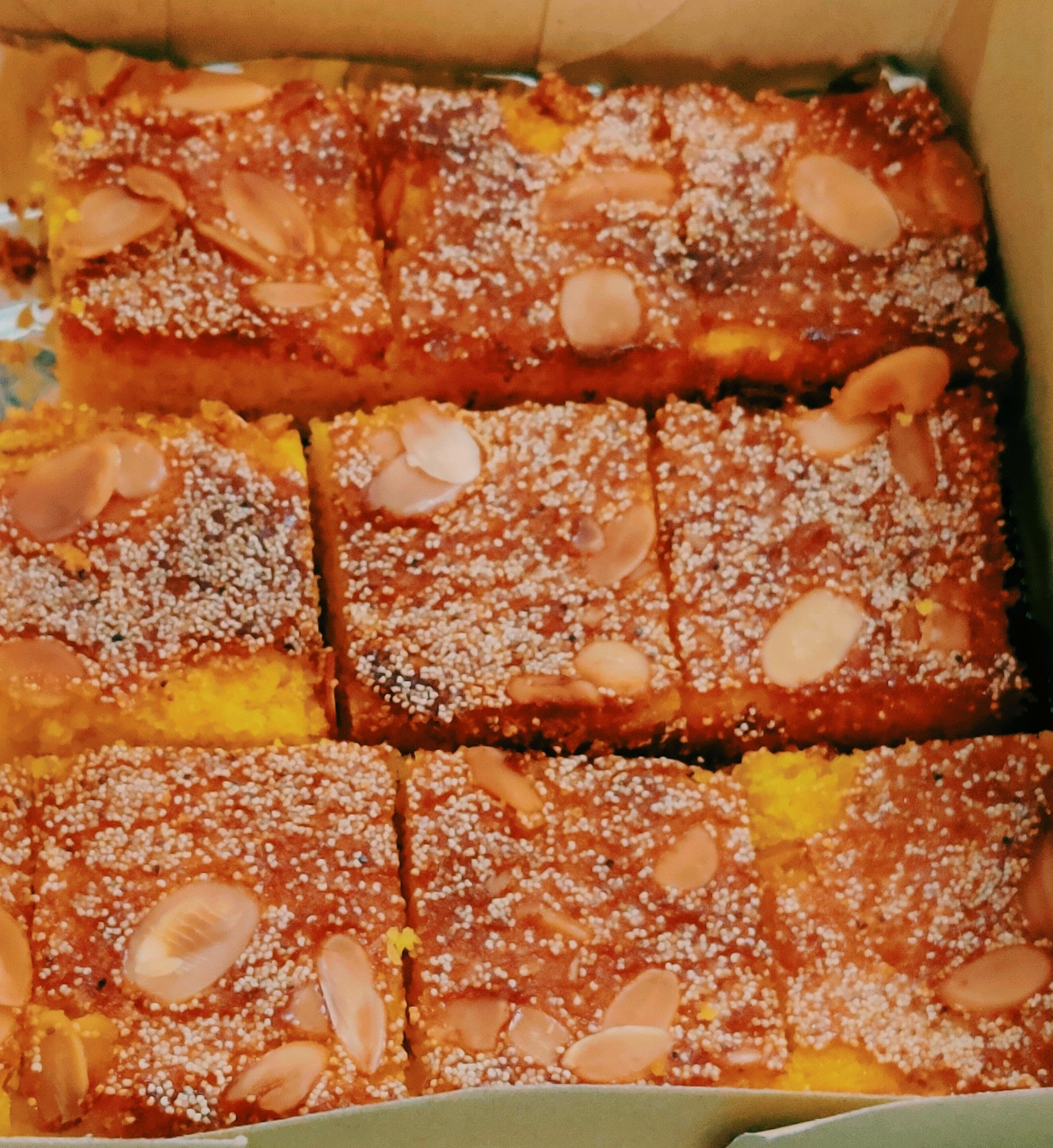 Baked semolina sweet squares with almonds